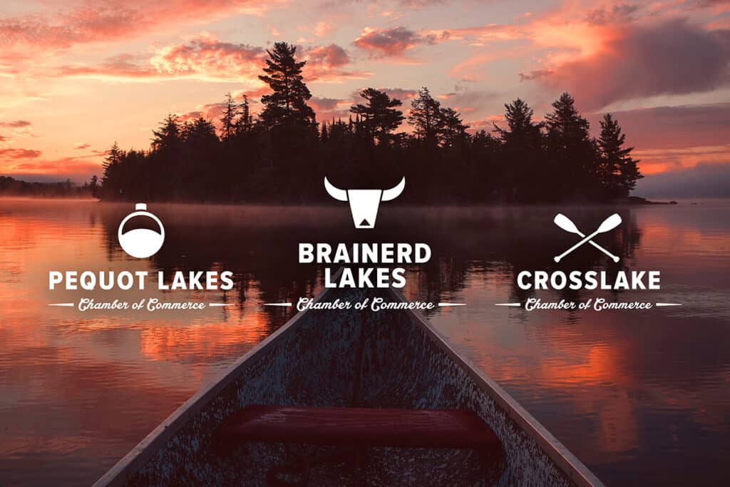 Canoe in Lake at sunset with white Chamber logo on top