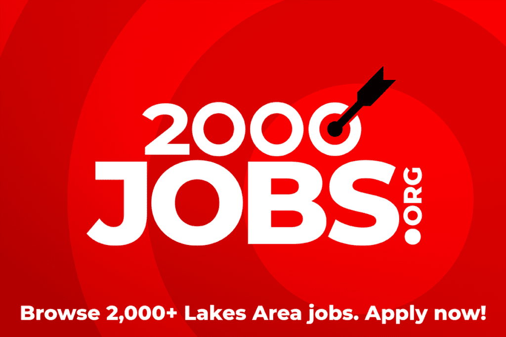 2000 Jobs logo white with red arrow going into bullseye on red background