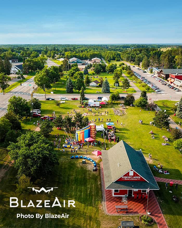 Aerial photo of Pequot Lakes trailside park during a carnival on a bright summer day