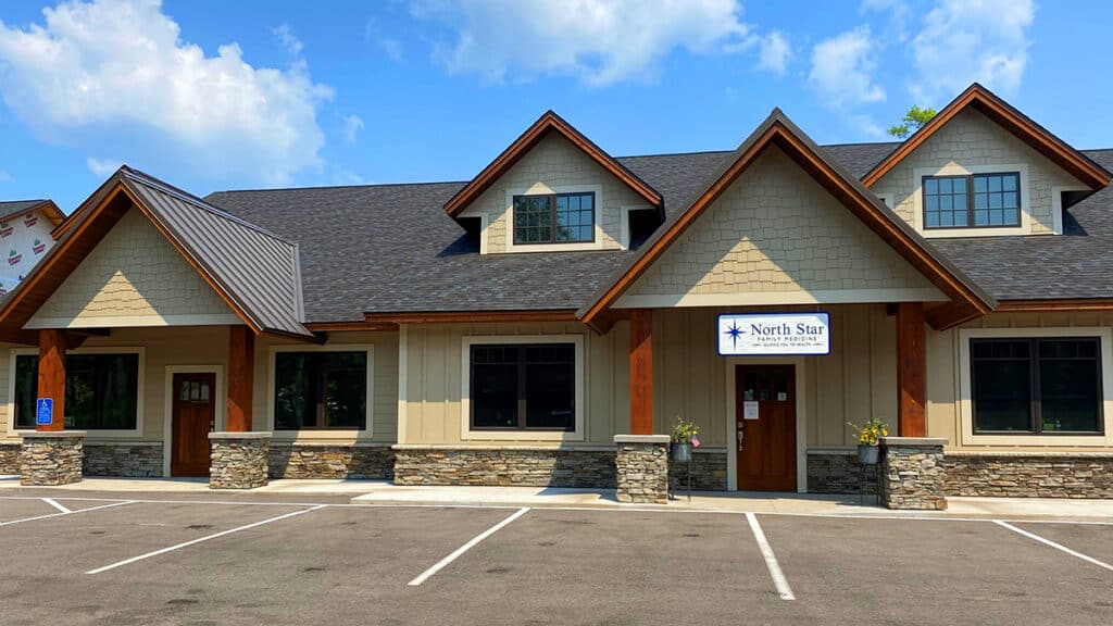 Photo of exterior of new building, North Star Family Medicine, on a sunny summer day