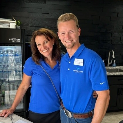 Photo of Jacob Hanson and another smiling woman at Business After Hours