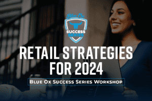 Photo of a smiling woman with dark hair and a blue shirt standing behind a retail counter helping a person purchase a cup of coffee with the heading "Retail Strategies for 2024 Blue Ox Success Series Workshop" overlaid in white